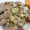 Ternera con champiñones